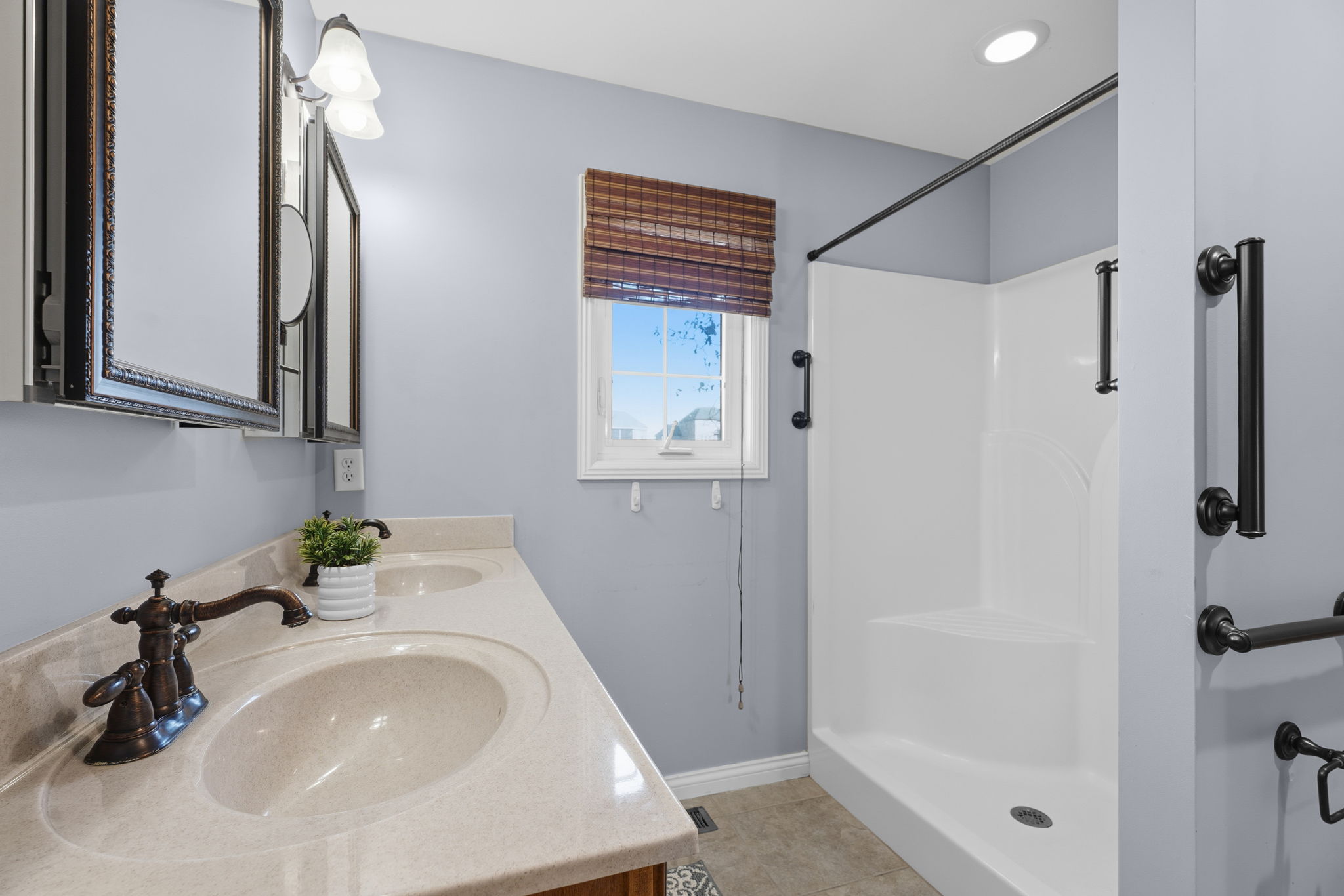 PRIMARY WITH TILE FLOORING IN BATH