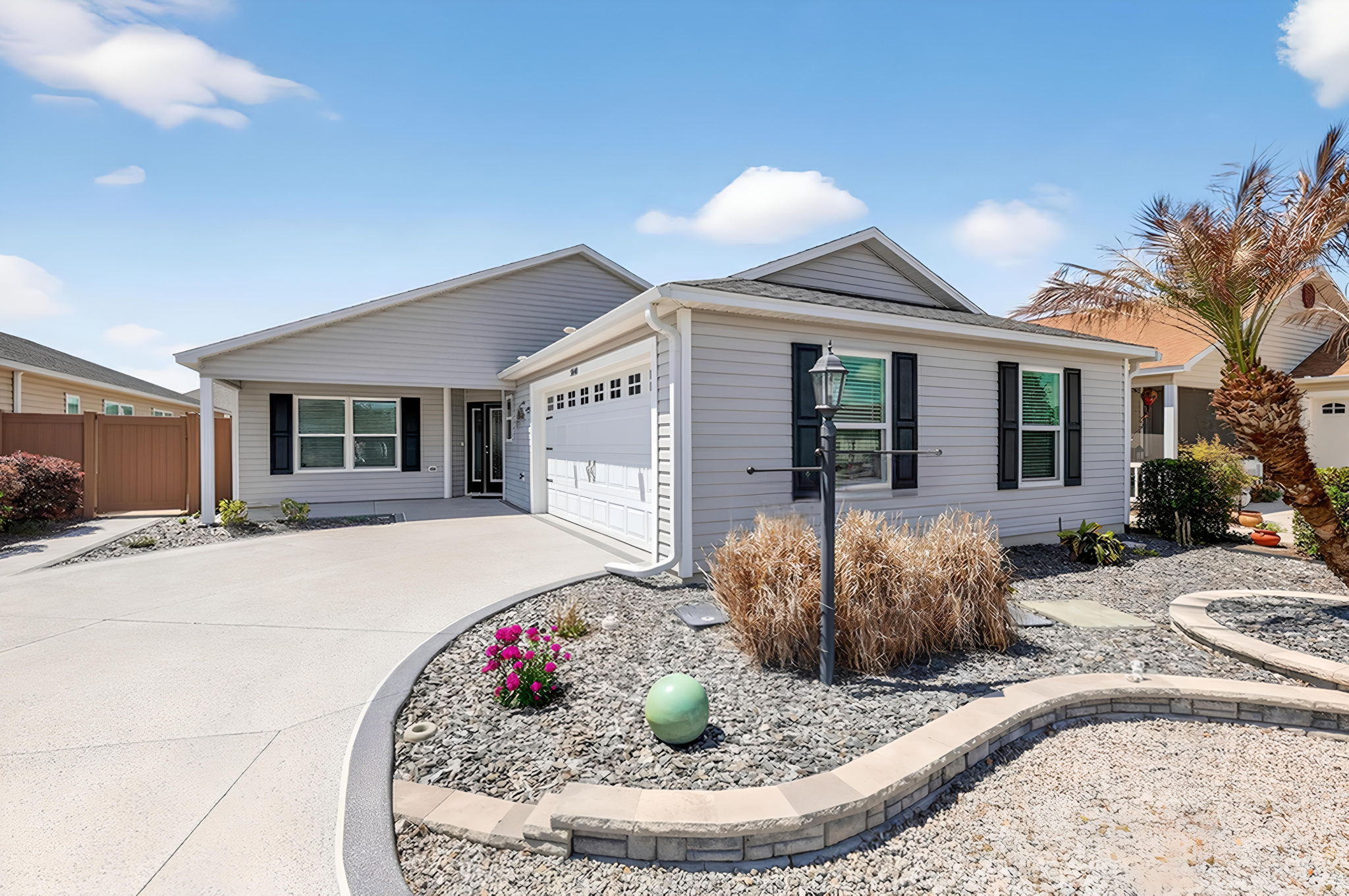 Front Elevation with Tiered Stoned Landscaping