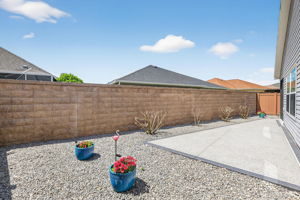 Rear Patio with Low-Maintenance Stoned Landscaping