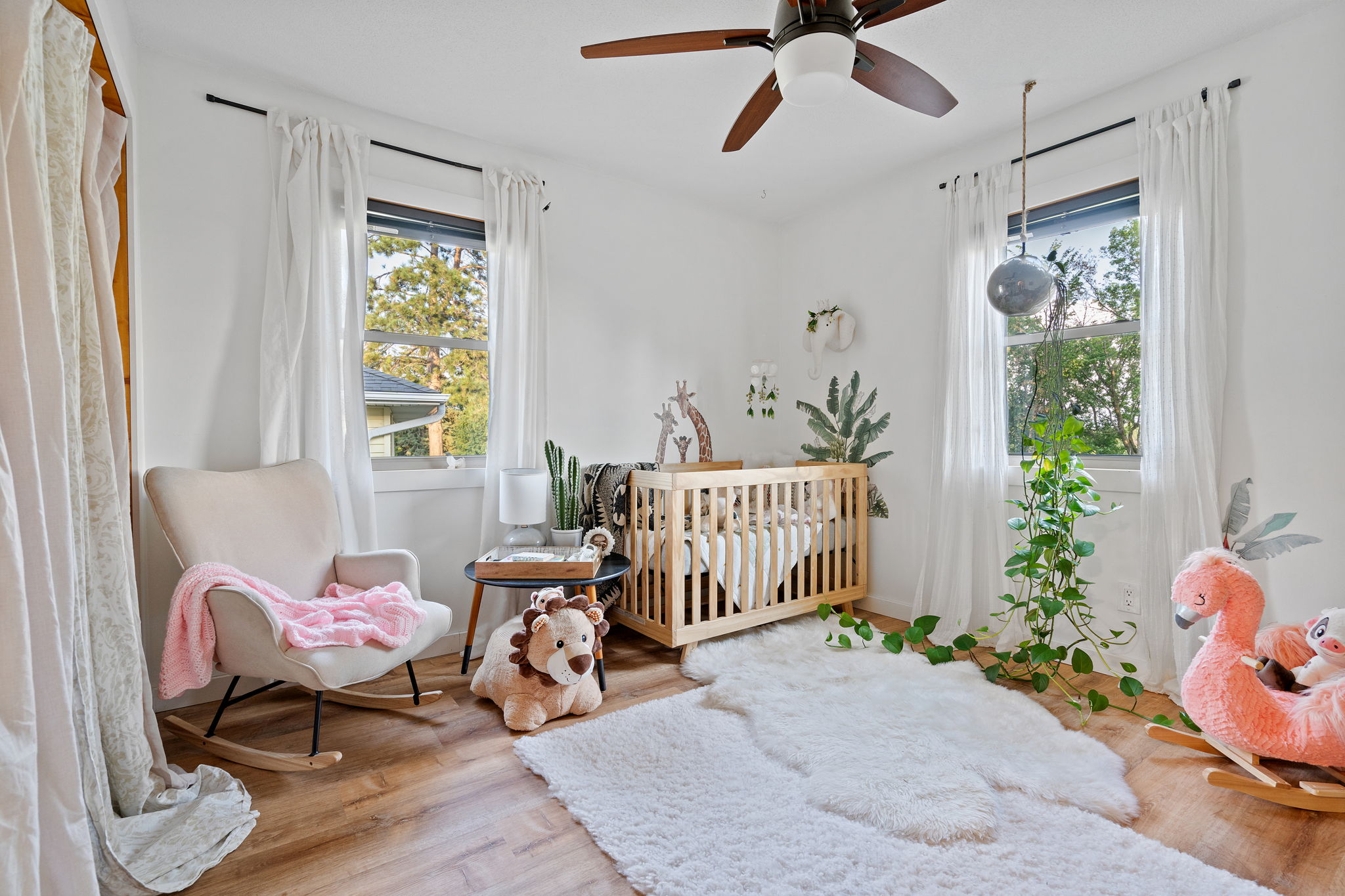 The smaller of two upper-level bedrooms at 5857 Oneka Lake Boulevard N works perfectly as a standard bedroom, nursery, reading room, or office.