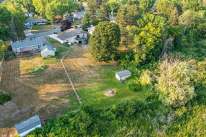 At 5857 Oneka Lake Boulevard N, not only do you get a massive fenced-in green space—you also enjoy a direct connection with nature in your own backyard.