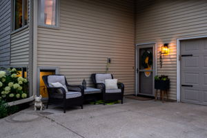 The generous concrete driveway at 5857 Oneka Lake Boulevard N offers extra room for front patio lounging space.