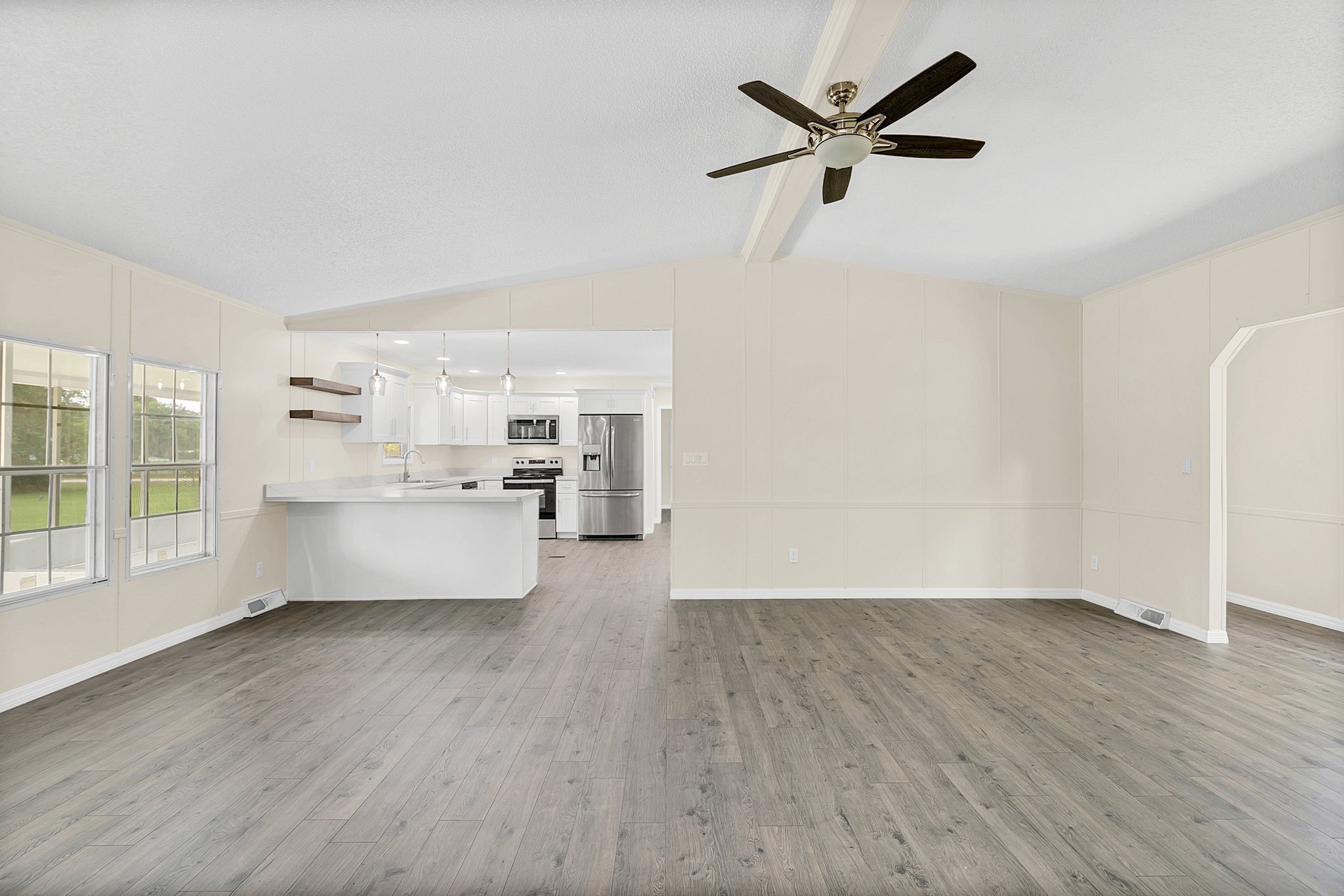 Living Room with Kitchen in the background