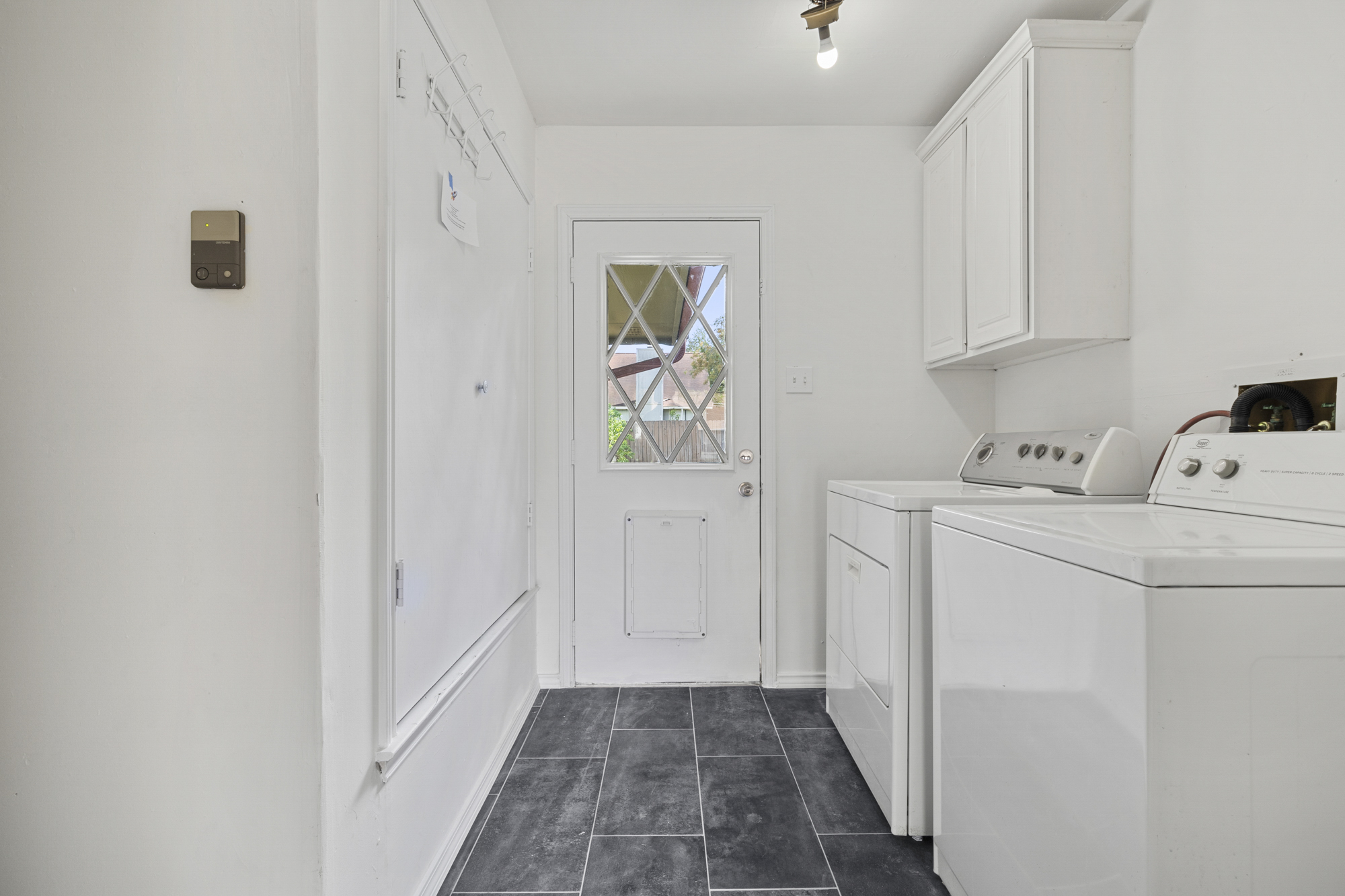 dedicated mud room/laundry area.  Dog doors to exterior and kitchen can be handy on a rainy day.