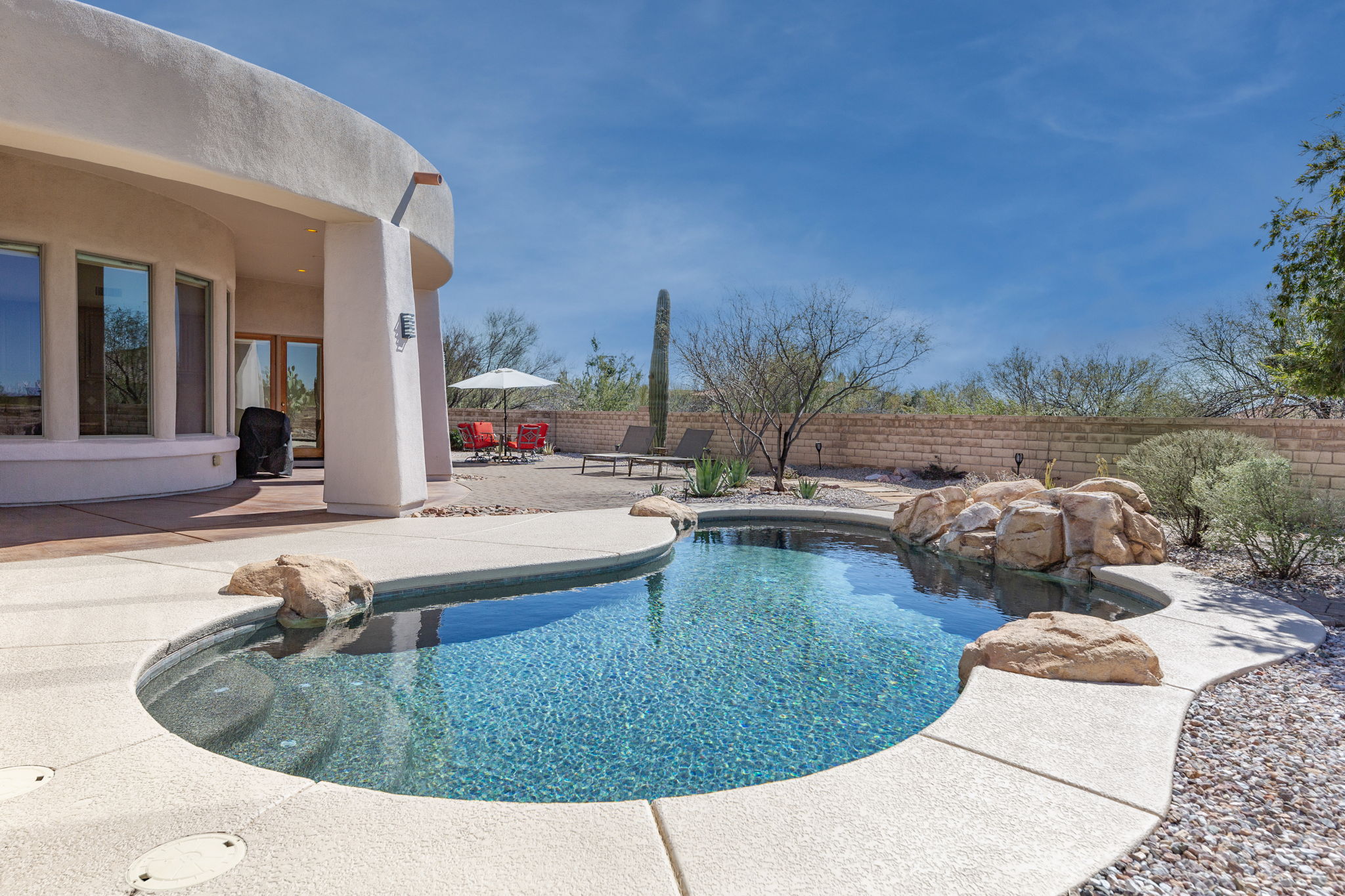 Heated Pool w/ Water Feature & Cool Deck