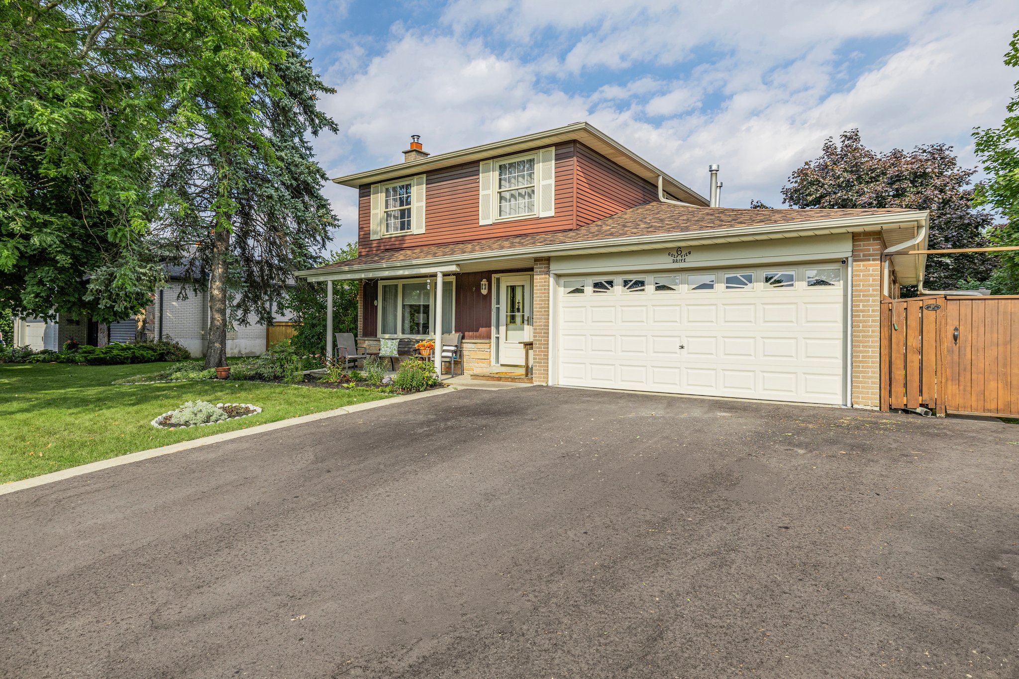 Driveway easily holds 5 vehicles