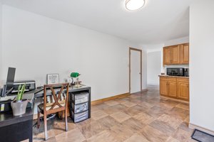 Main Floor Den/Access Door to Garage