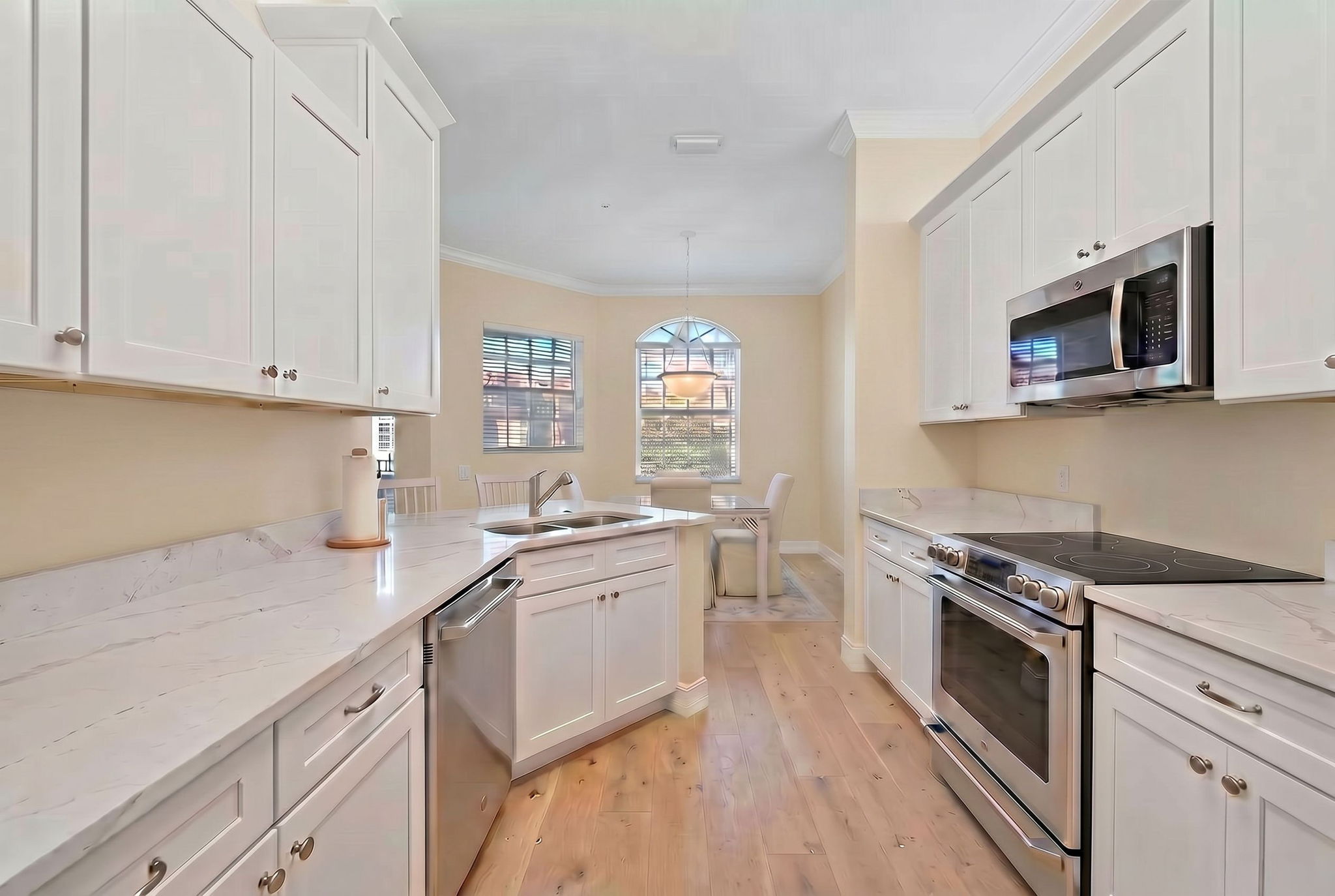 Digitally Enhanced white cabinets with SS appliances