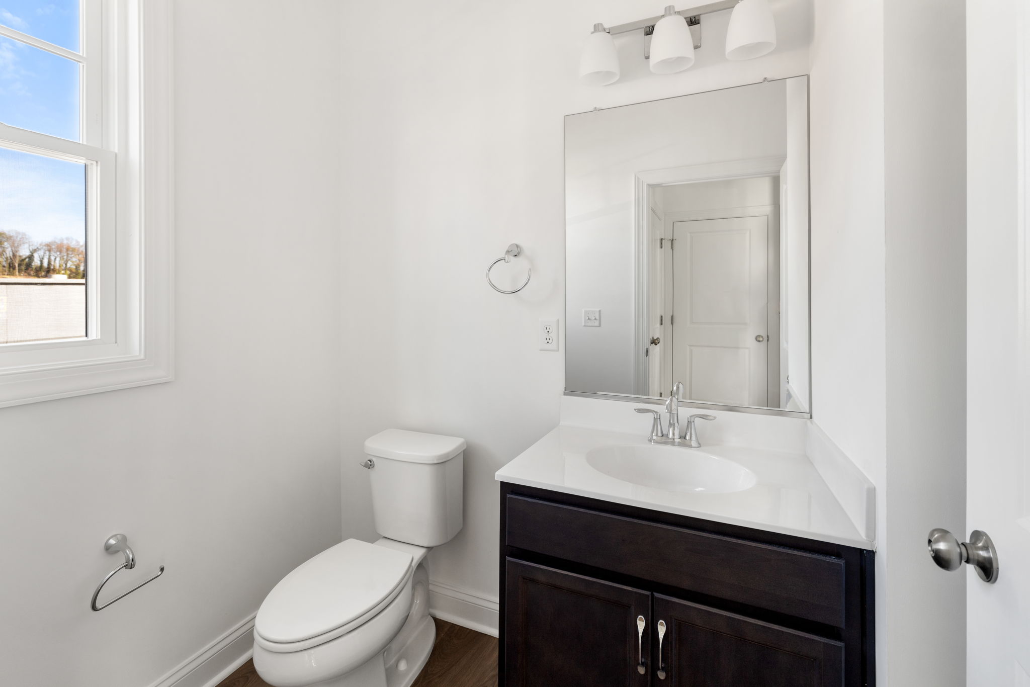 1st floor powder room off of the kitchen area.