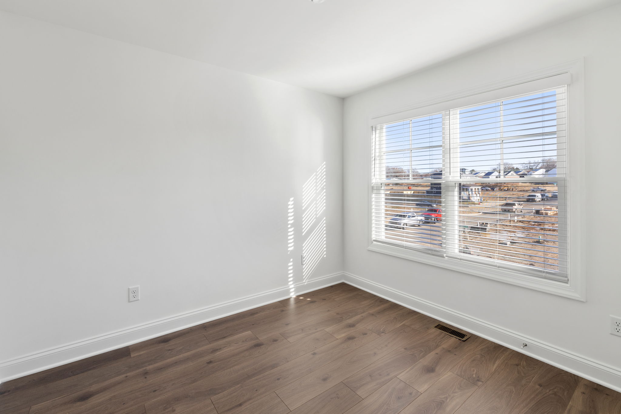 2nd floor rear guest bedroom with LVP flooring and a nice size closet.