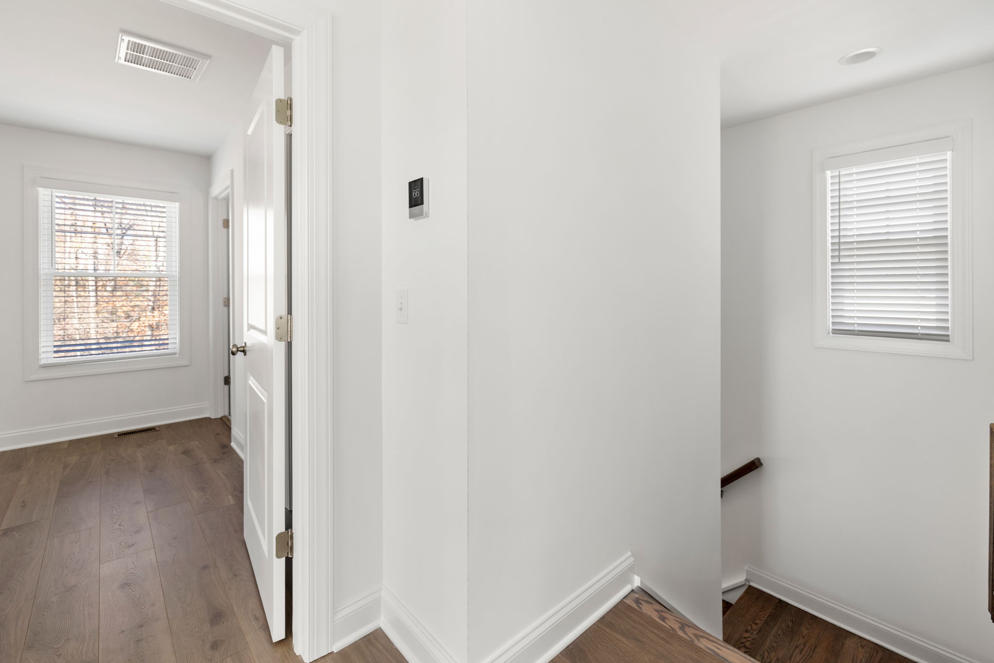 2nd floor landing with LVP flooring.