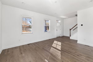 Living room with LVP flooring.