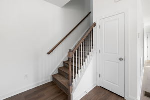 Finished wood stairs up to 2nd floor.