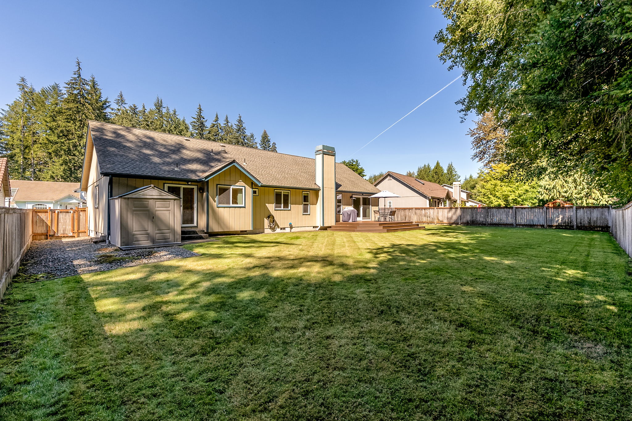 Great, level back yard has so much room to run.
