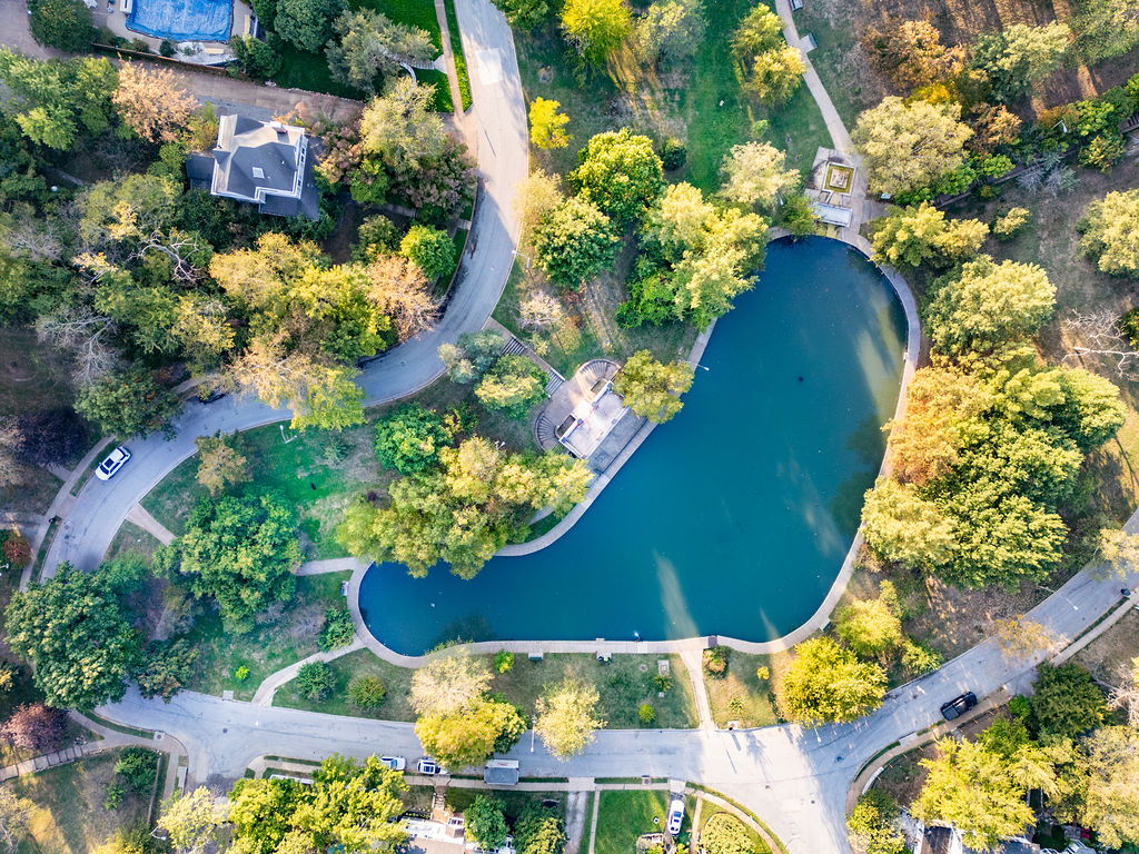 Feed ducks at the historic boathouse, walk the trails with your pup, enjoy the fountains, play a game of basketball, take the kiddos to the playground.