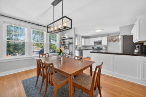 The formal dining room also flows beautifully into the updated kitchen.  Use the breakfast bar as a buffet for your house-warming party!