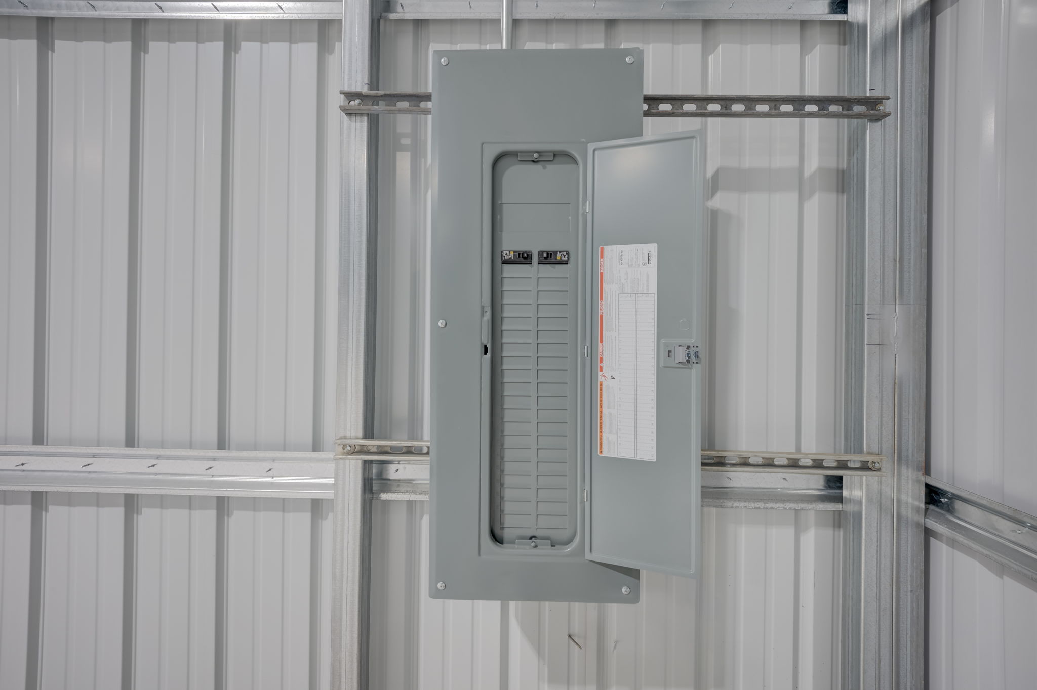 Detail shot of the heavy-duty commercial electrical panel providing ample, upgraded power for machinery or shop equipment.
