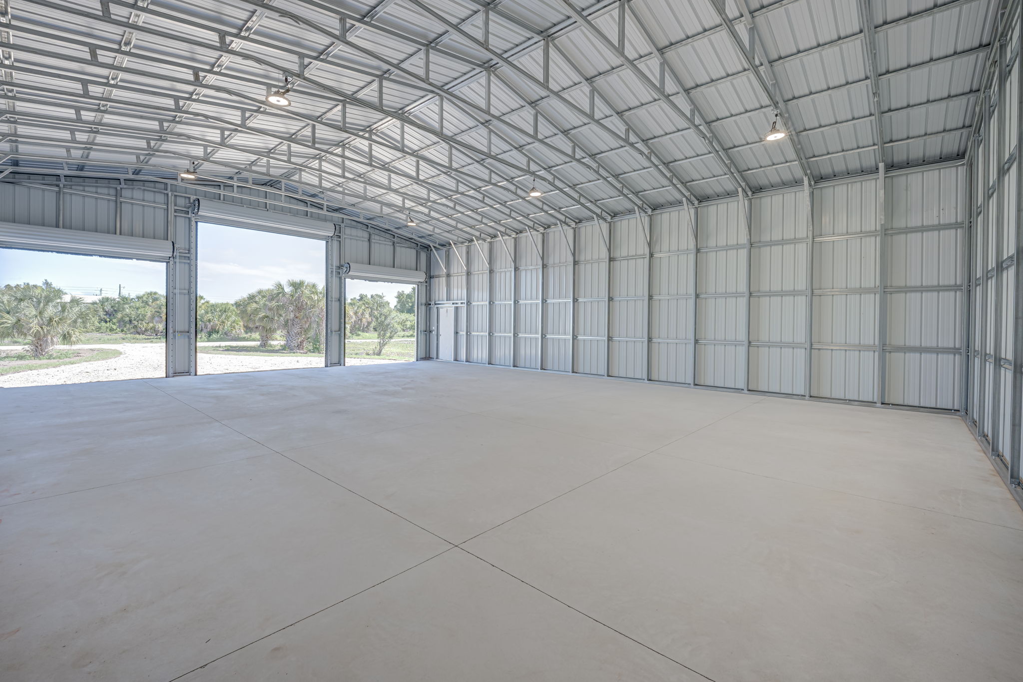 Close-up interior view of the commercial roll-up door highlighting its durable, impact-resistant wind-rated construction.