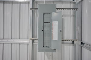 Detail shot of the heavy-duty commercial electrical panel providing ample, upgraded power for machinery or shop equipment.