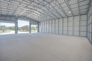 Close-up interior view of the commercial roll-up door highlighting its durable, impact-resistant wind-rated construction.