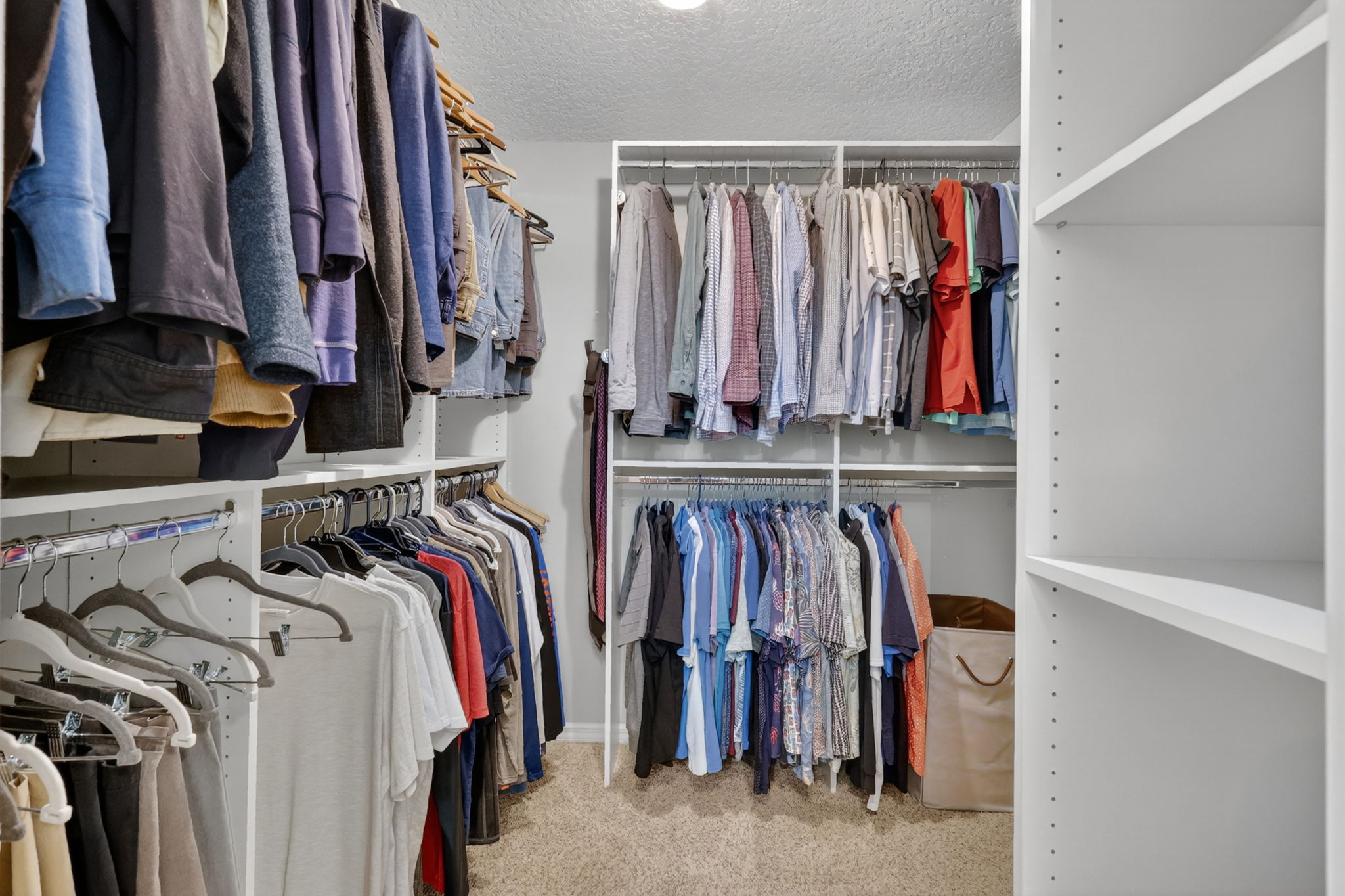 Primary Walk-In Closet with custom built-ins