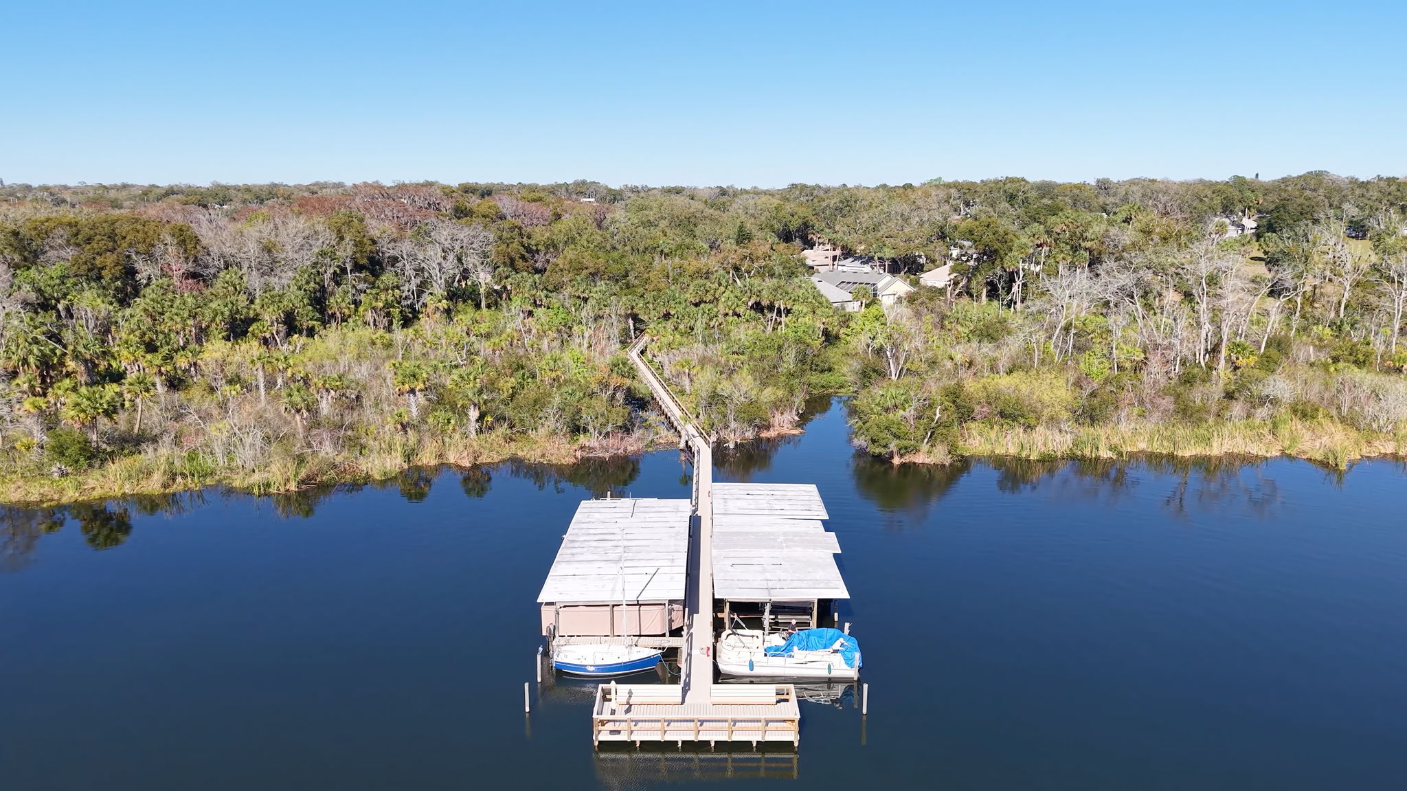 Community Dock with Boat Slips on Lake Dora