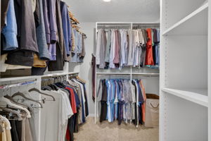 Primary Walk-In Closet with custom built-ins