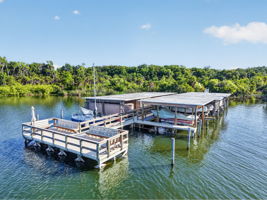 Private High Point Community boat dock with observation deck & seating at the end