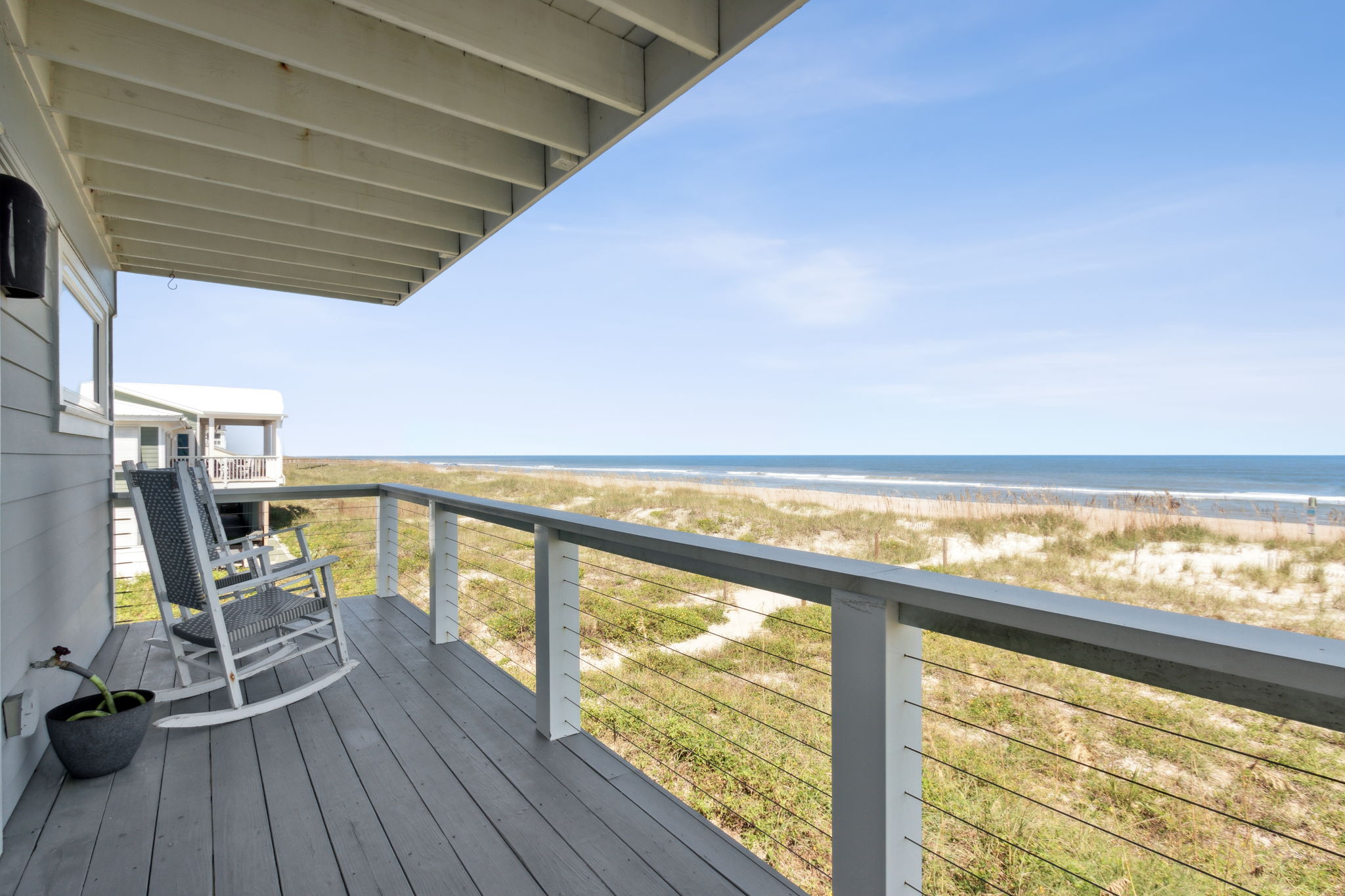 Relax on the large covered deck or...