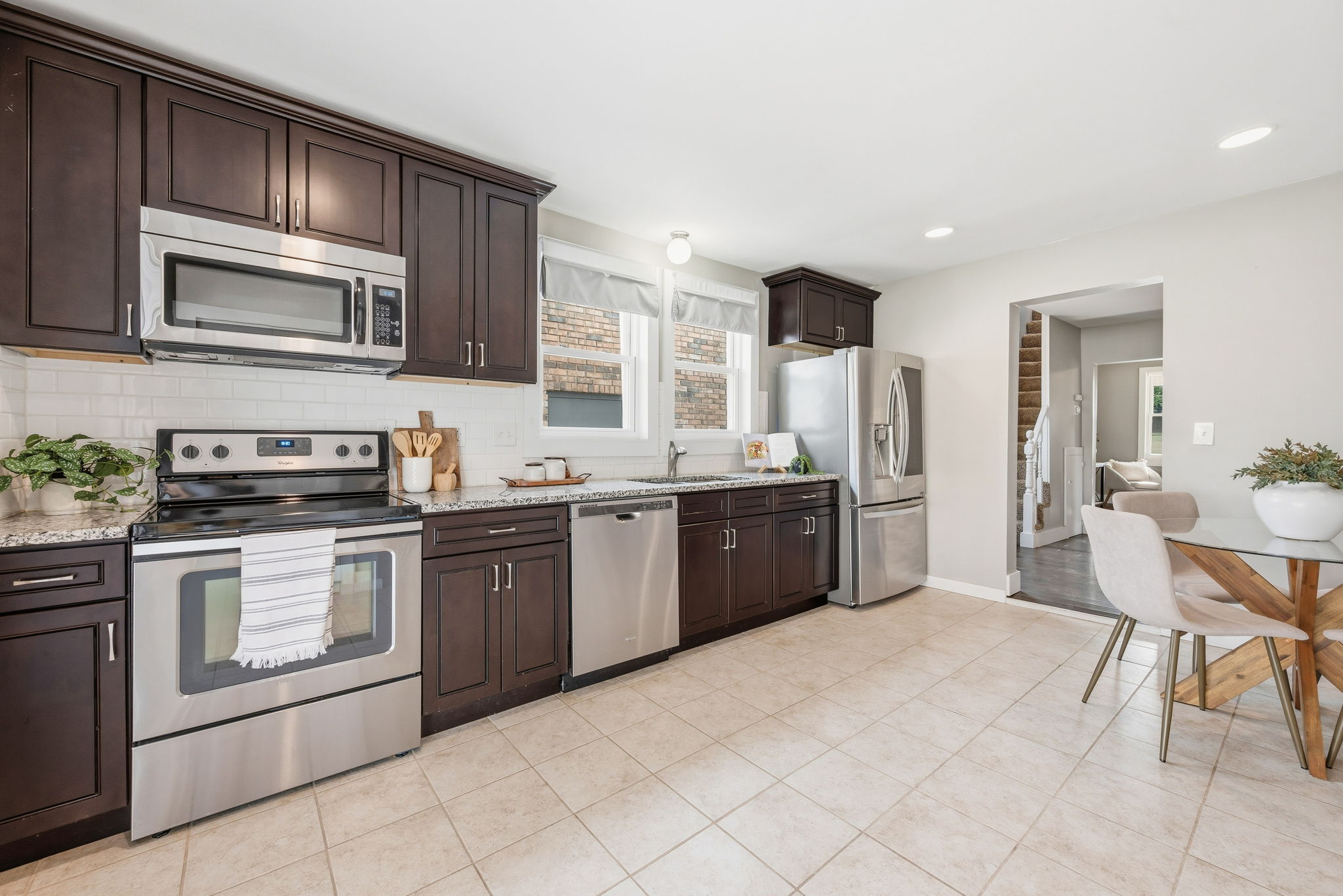 The chef's kitchen is fully updated with all appliances included