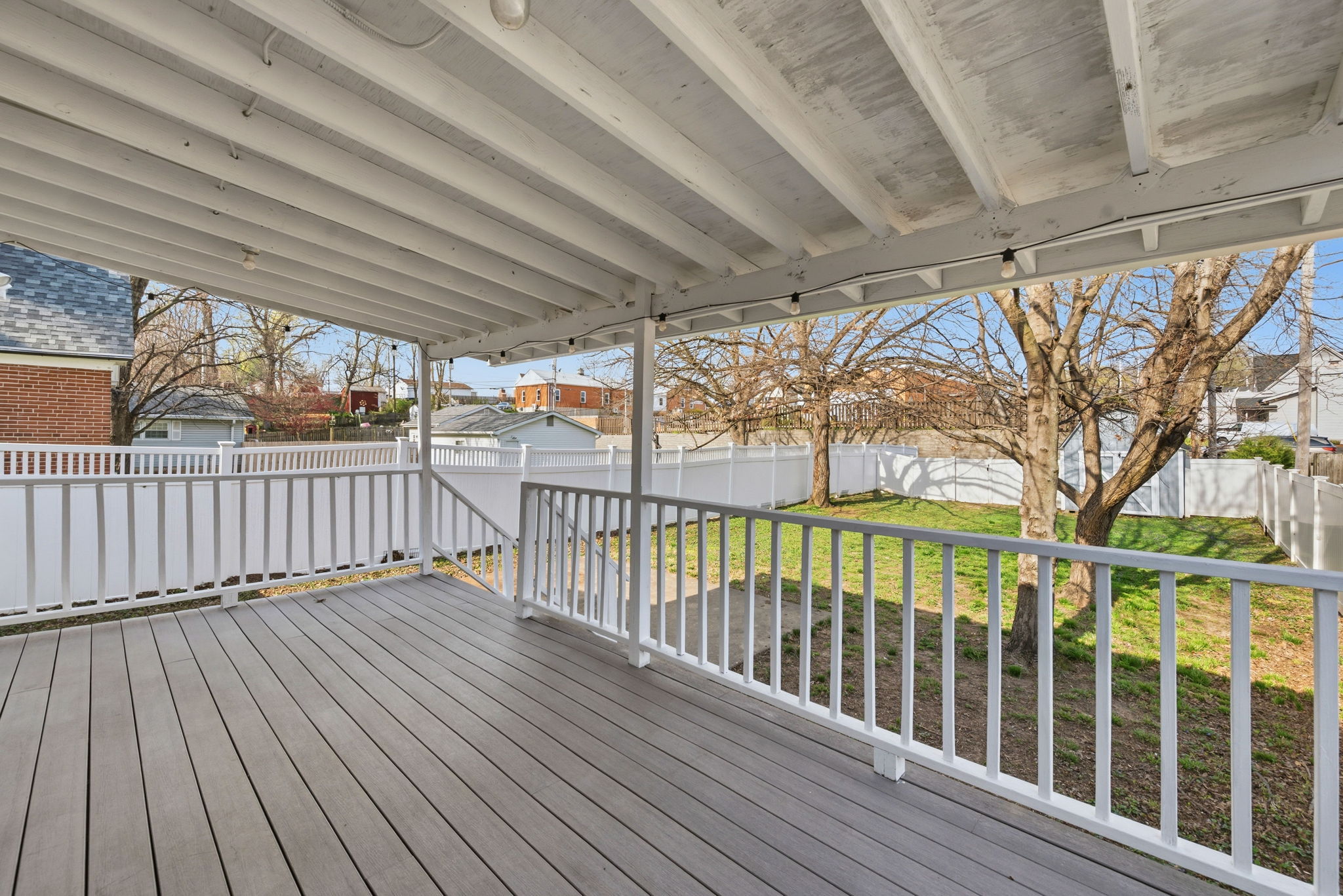 The fully-covered composite deck is idea for morning coffee or rainy evenings under the twinkle lights.