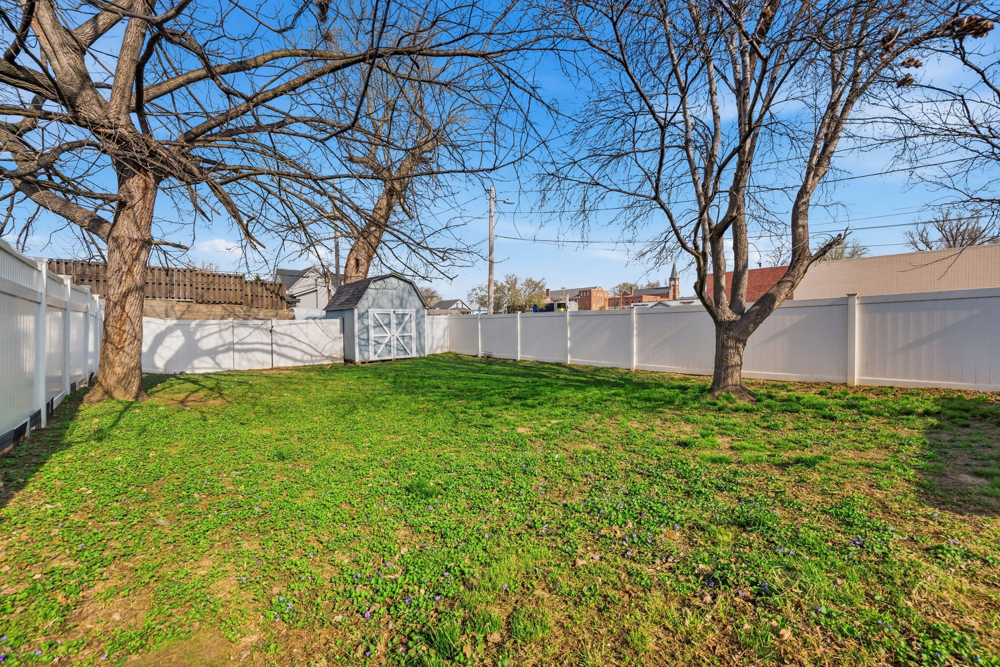 The backyard is HUGE, very private, and fully fenced