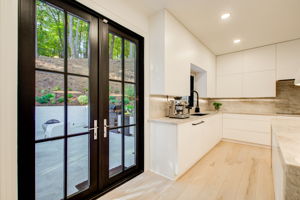 14 Kitchen F Detail w Patio Walkout