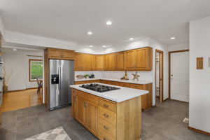 Dining room straight ahead and to the right is large pantry, garage entrance and 1/2 bath with dog wash!