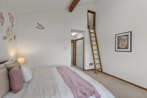 Another view of the upper level guest bedroom with access to loft!