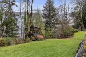 A magical waterfront treehouse with deck!