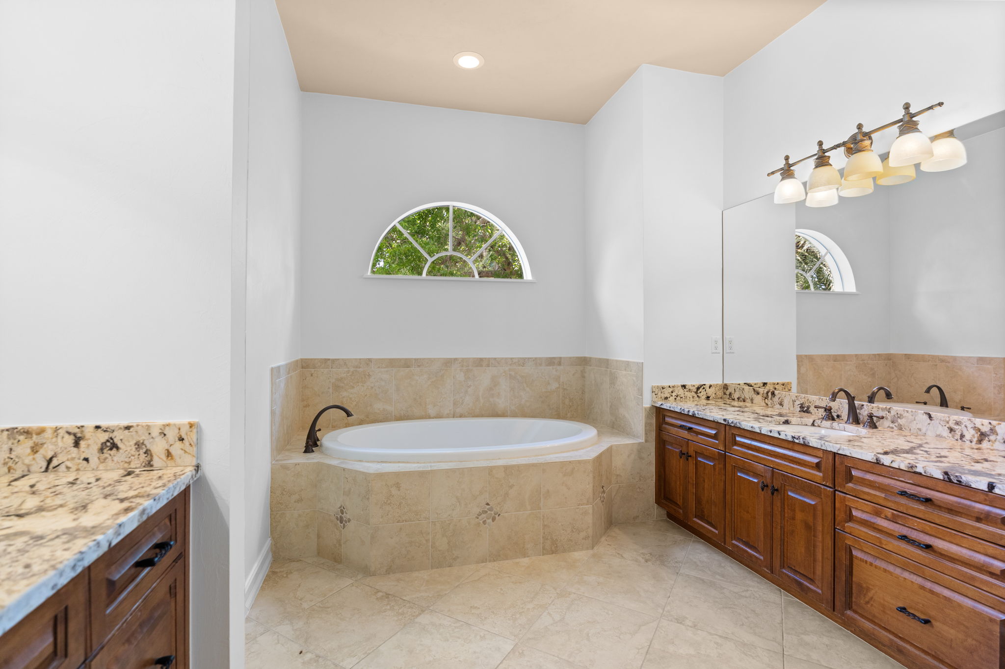 His and Her sinks with separate walk in shower