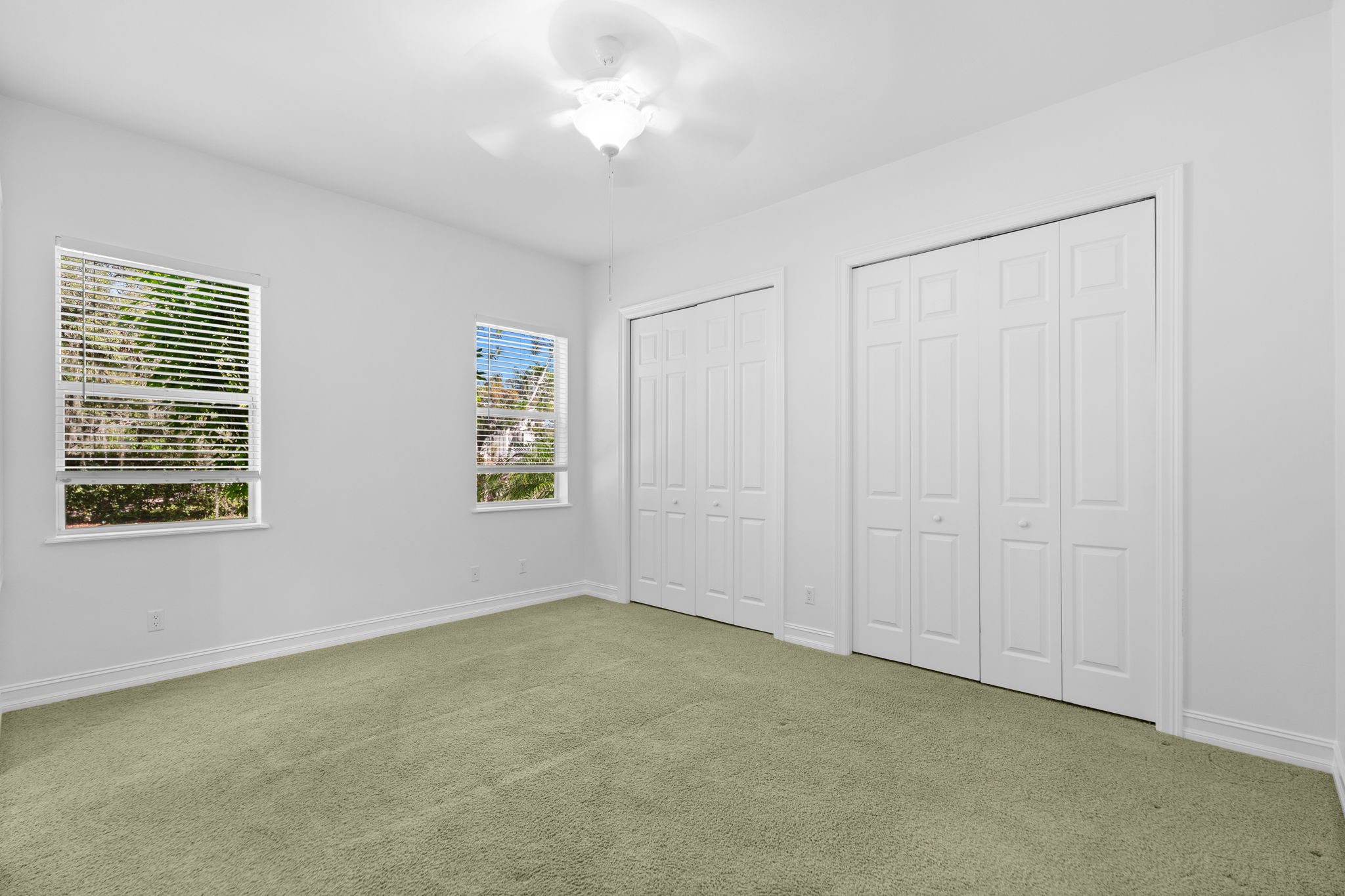 bedroom 3 with duel california closets & private bath