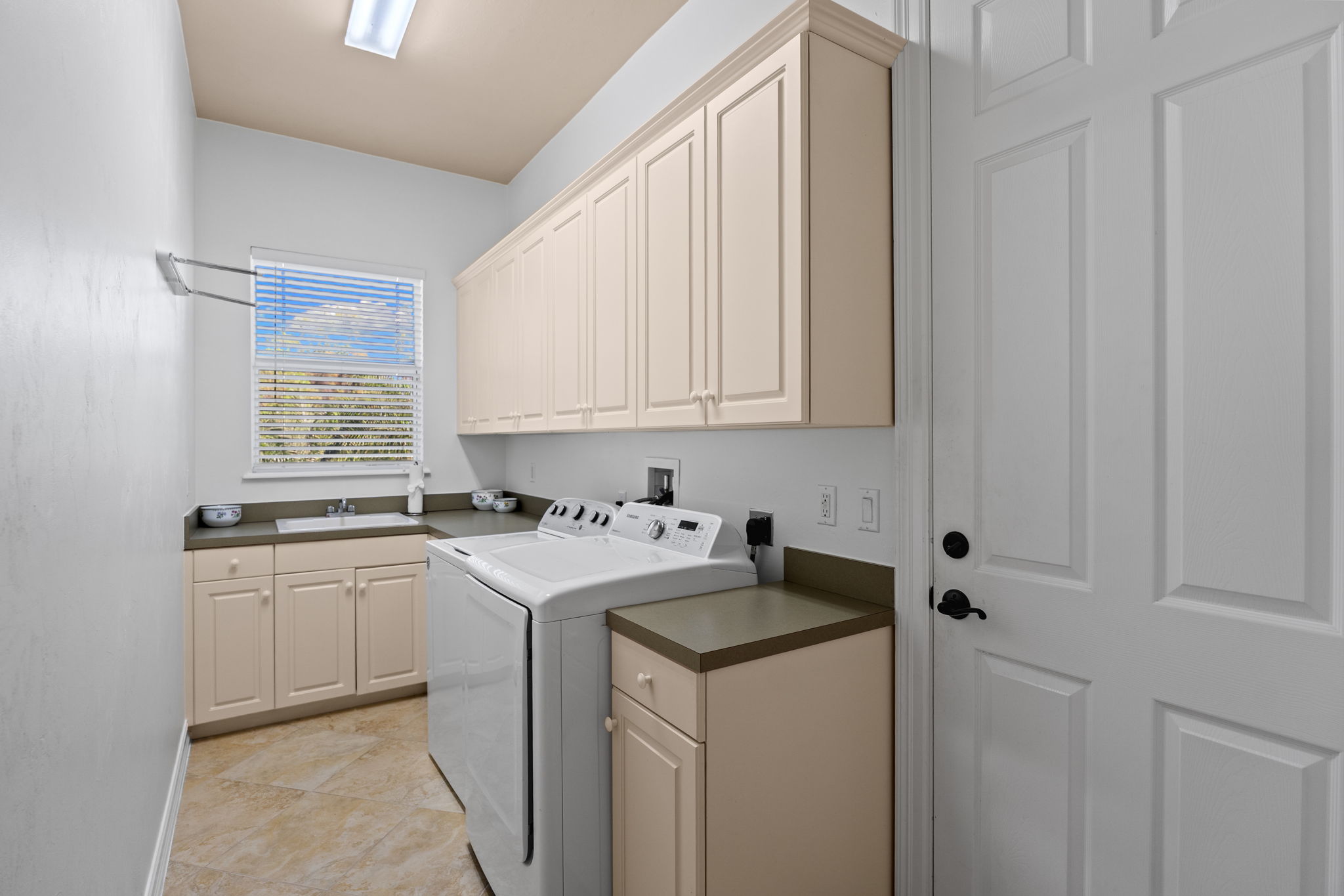 Laundry room leads to huge 2.5 car garage