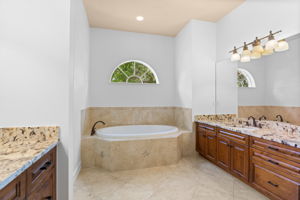 His and Her sinks with separate walk in shower