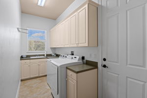 Laundry room leads to huge 2.5 car garage