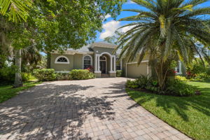 Grand enterance on .66 Acres w mature trees