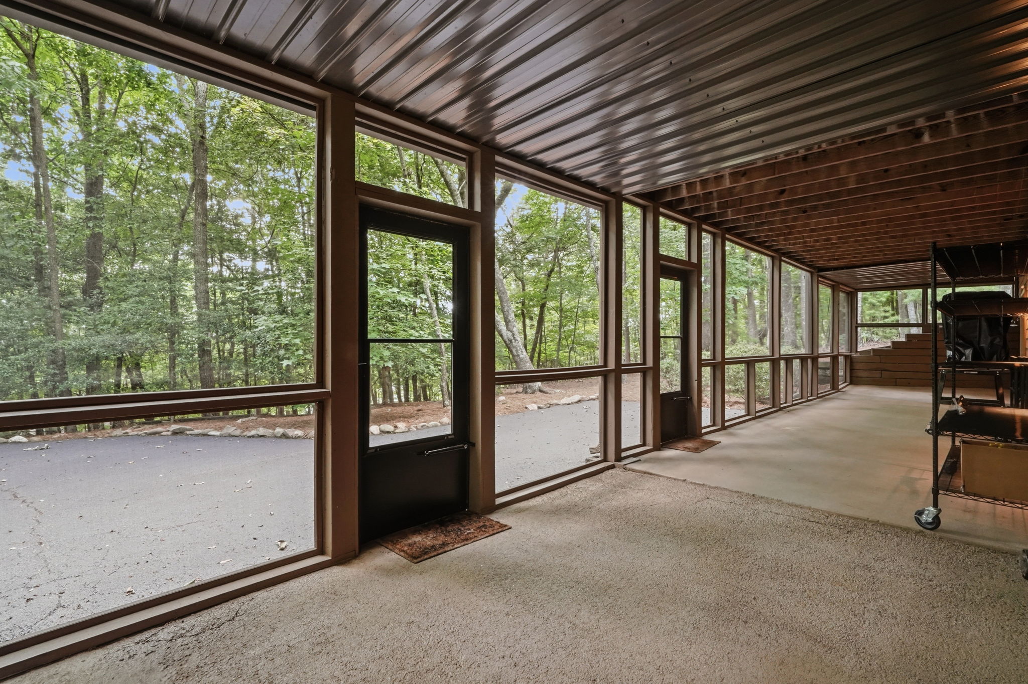 Lower level covered entrance patio