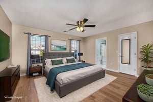 23 front bedroom virtually staged.jpeg