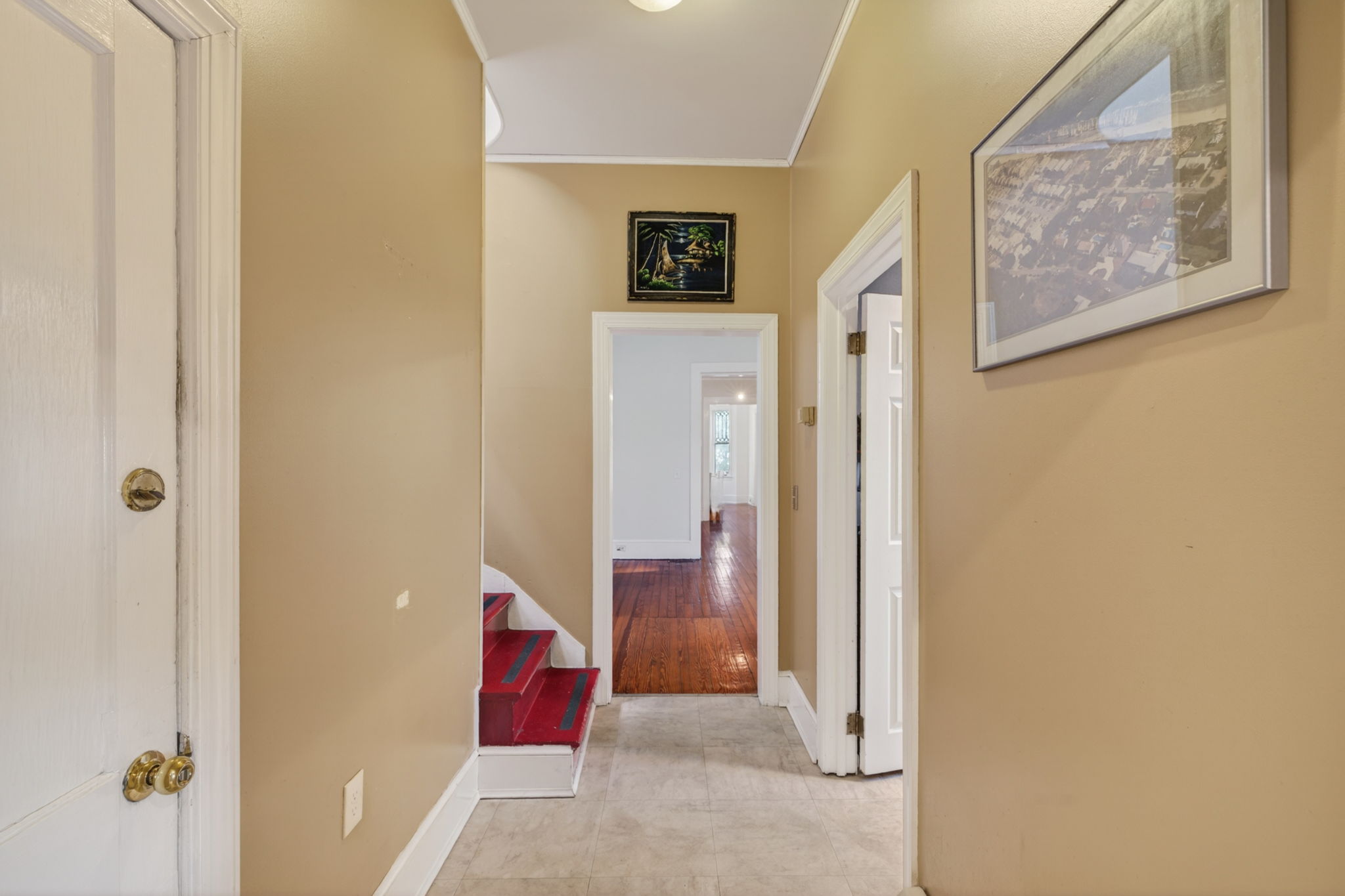 back stairs, half bath and hall way from living space to kitchen