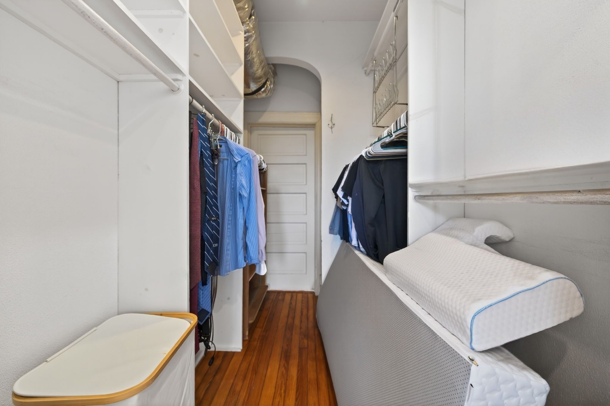 spacious walk in closet in primary