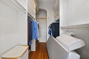 spacious walk in closet in primary