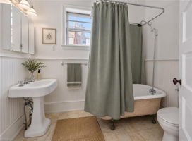 Virtually staged shared hall bath