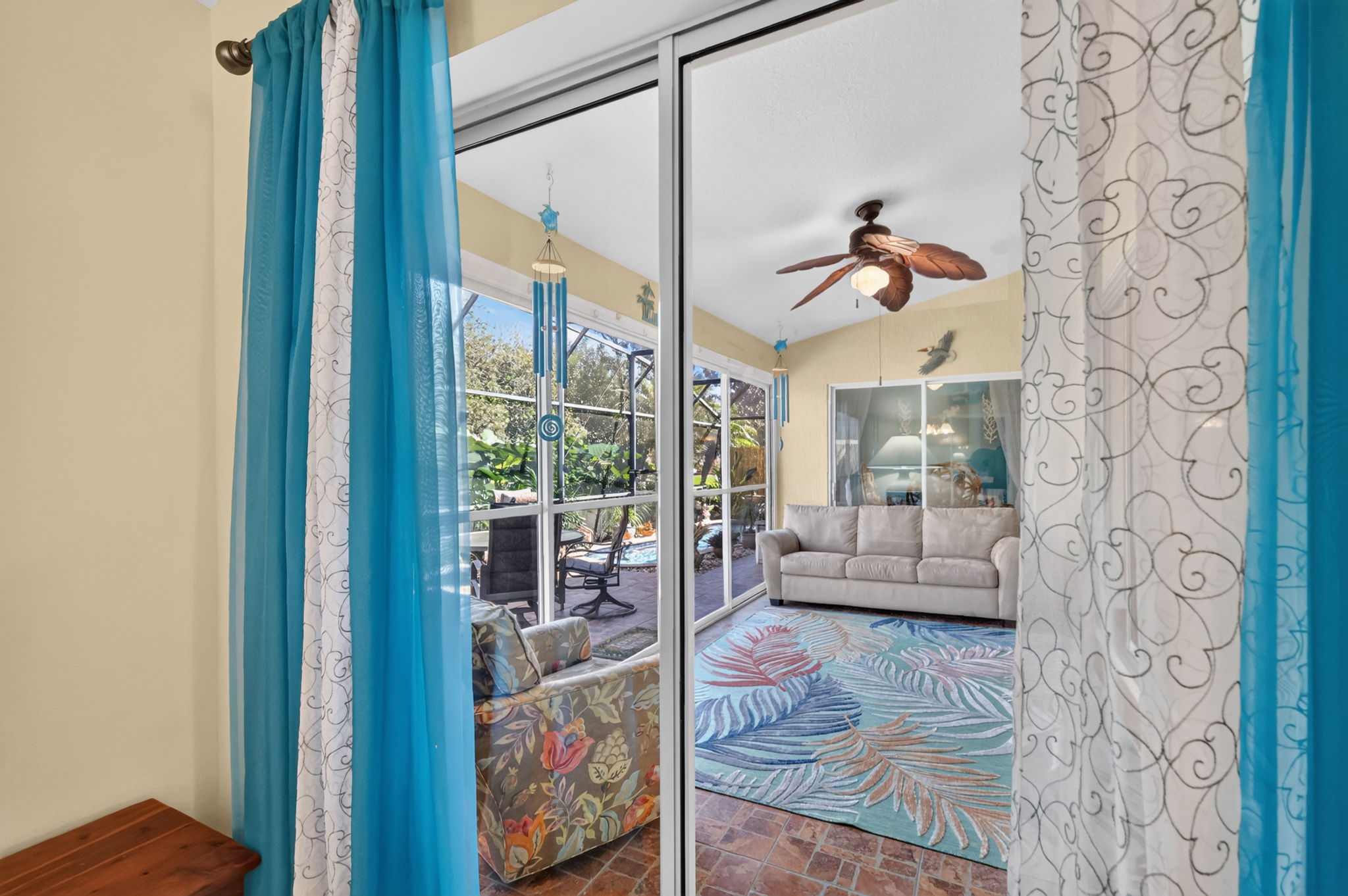 Primary Bedroom Sliding Glass Doors to Enclosed Lanai