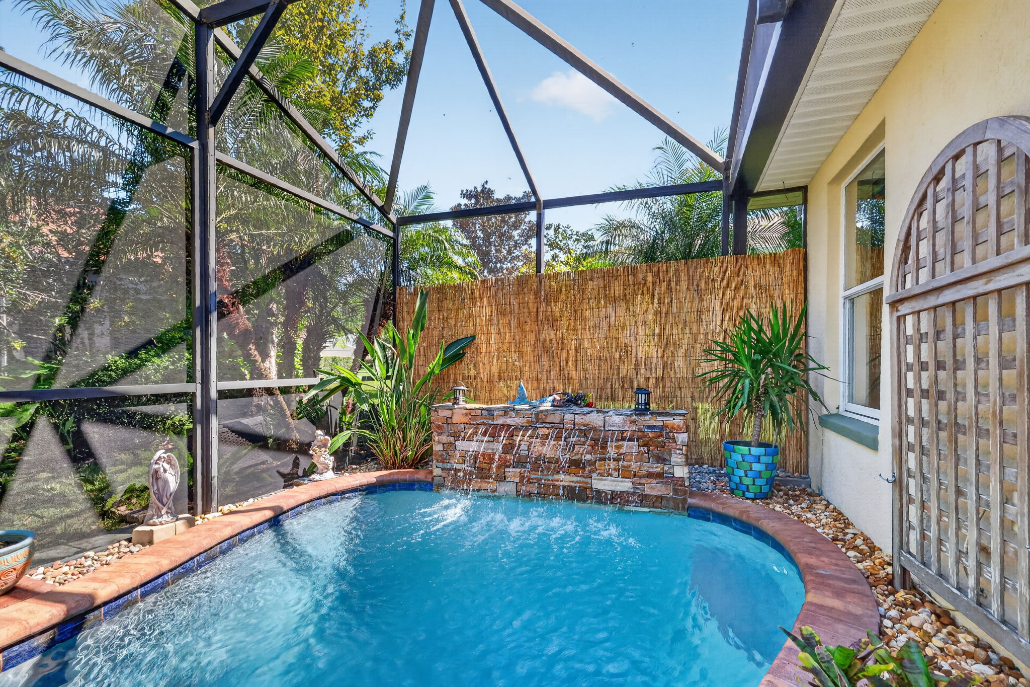 Lagoon Swimming Pool with Waterfall and Tropical PRIVACY Landscaping!
